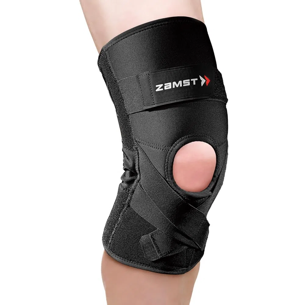 Zamst ZK-Protect Knee - Ginocchiera per Stabilizzazione legamenti anteriore LCA, laterale LCL e mediale LCM, sostegno articolazione, menisco e rotula - Basket, Sci, Volley, Calcio e altri sport (M)