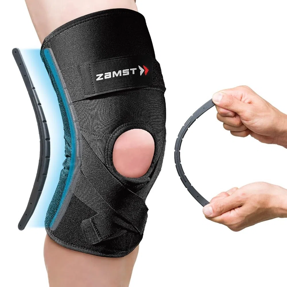 Zamst ZK-Protect Knee - Ginocchiera per Stabilizzazione legamenti anteriore LCA, laterale LCL e mediale LCM, sostegno articolazione, menisco e rotula - Basket, Sci, Volley, Calcio e altri sport (M)